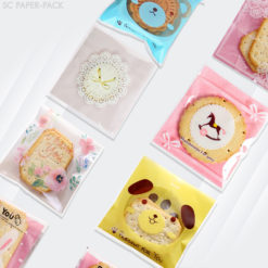 ซองพลาสติก OPP ใส มีเทปกาว พิมพ์ลาย ขนาด 14x14+3 cm. (แพ็ค 100 ใบ)